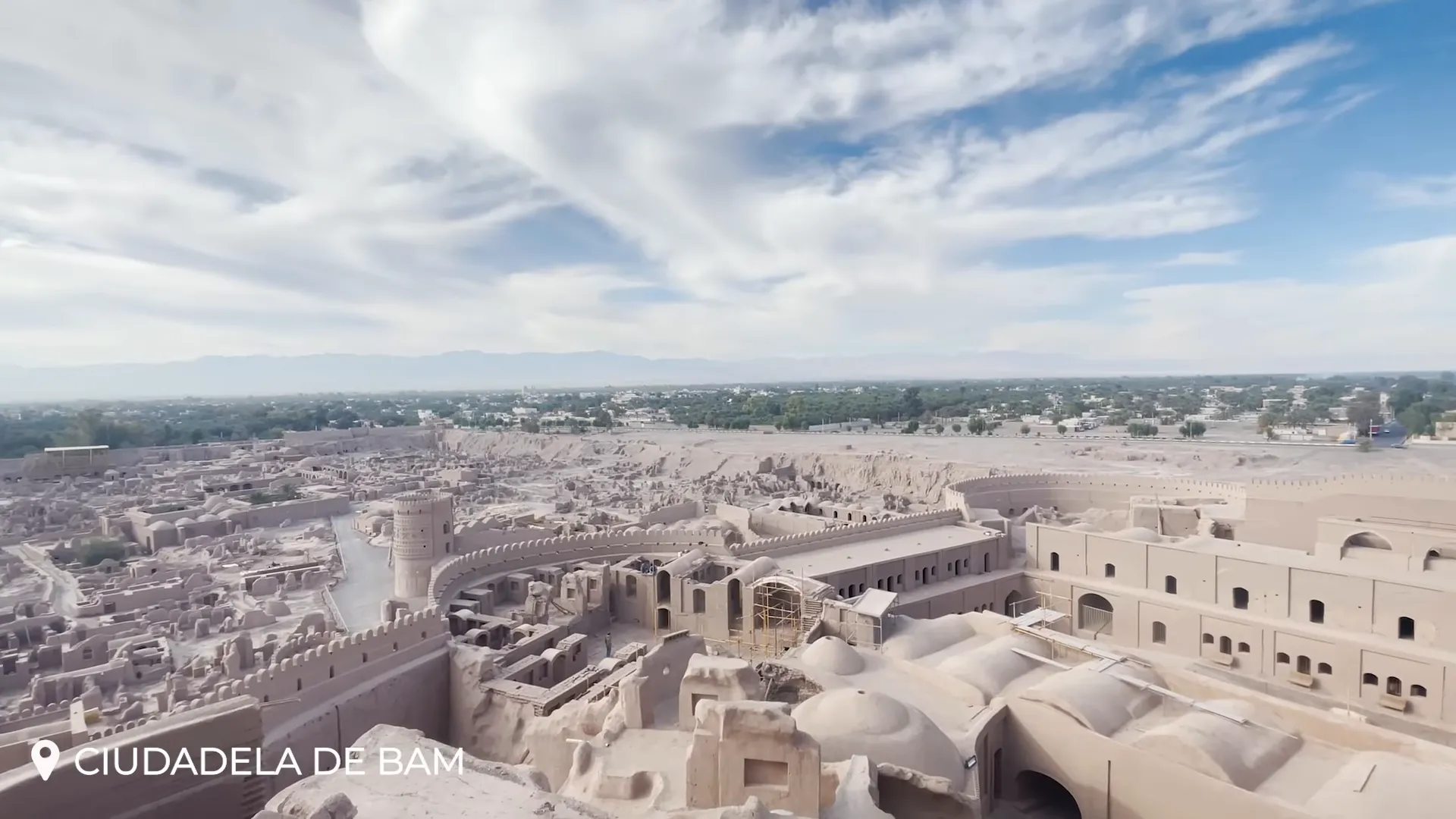 Aerial view of the adobe citadel of Bam with surrounding desert landscape
