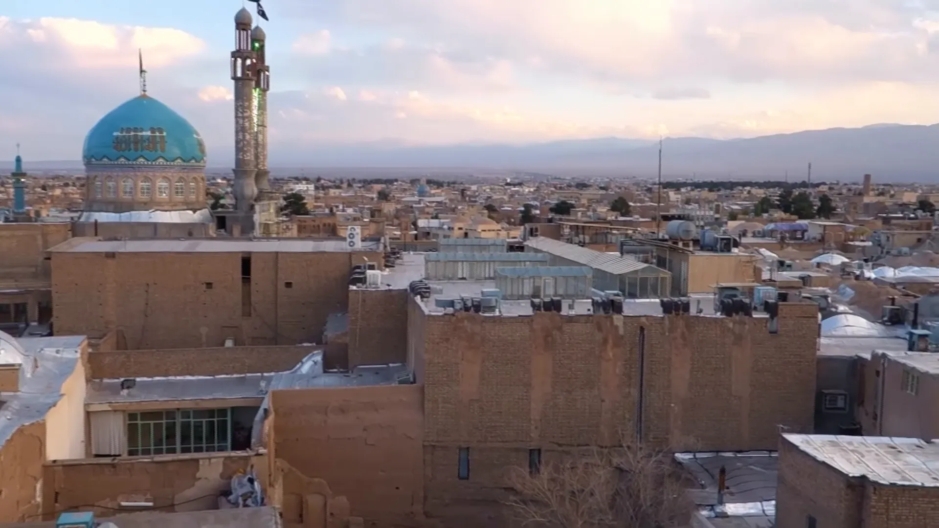 Traveler walking through an ancient street at dusk reflecting on the journey