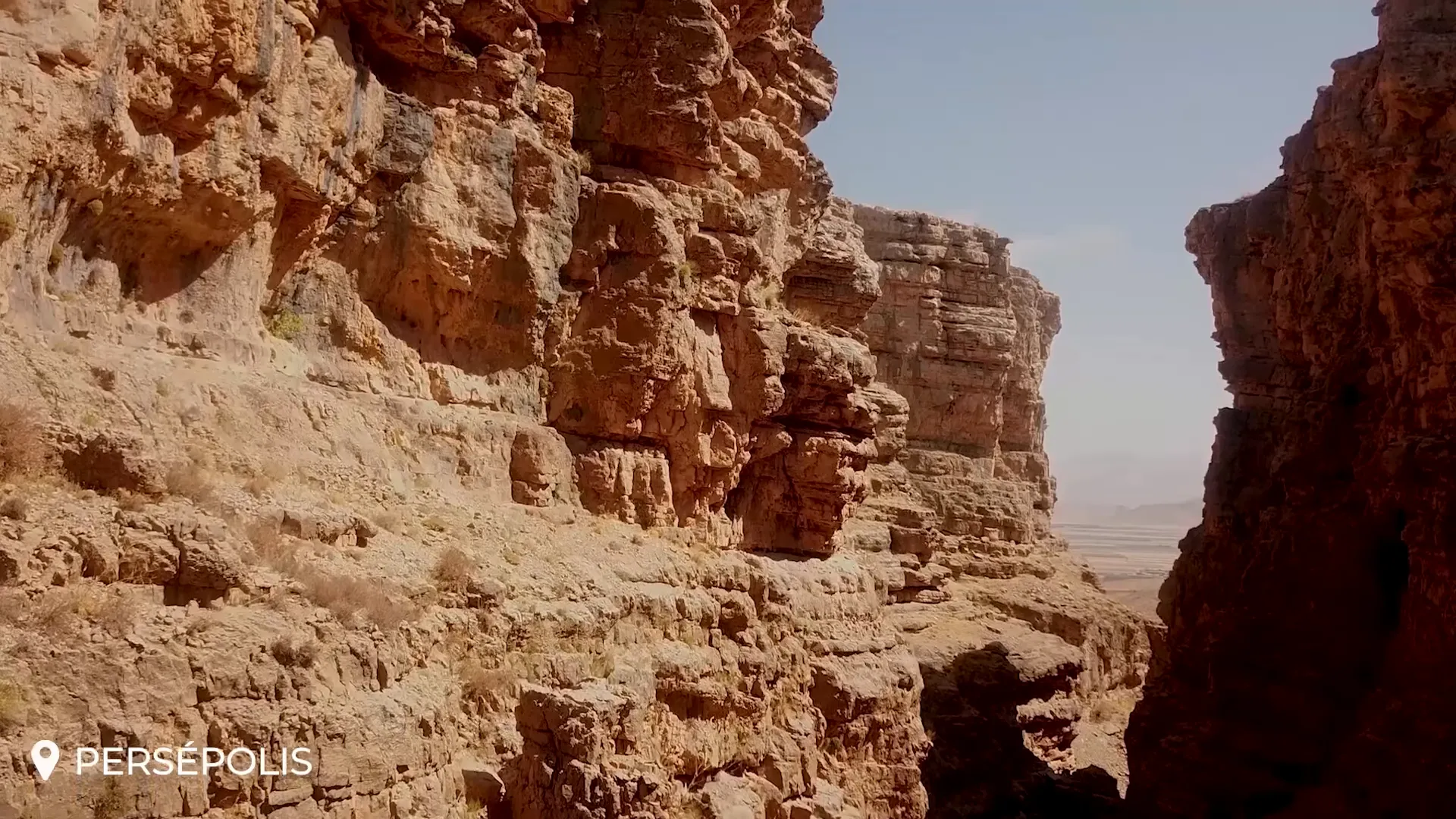 Long shadows and reliefs at Persepolis during sunset, ideal for photography