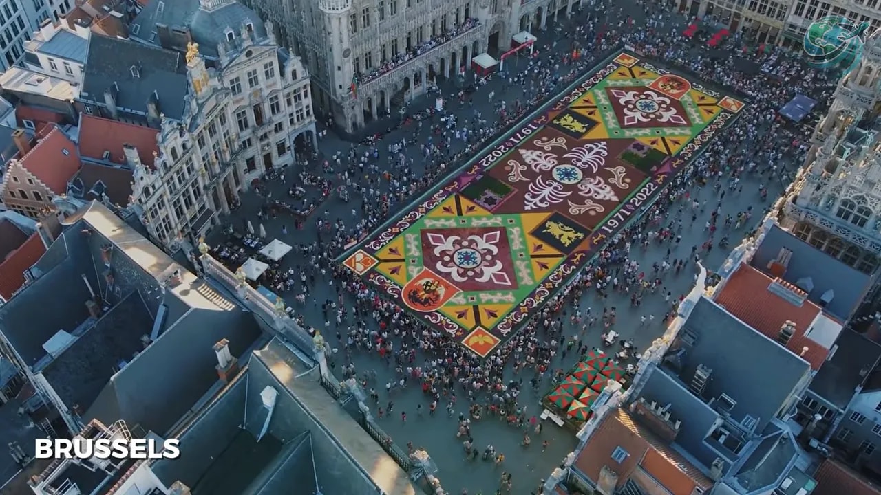 Aerial view of Brussels Grand Place filled with a colorful flower carpet
