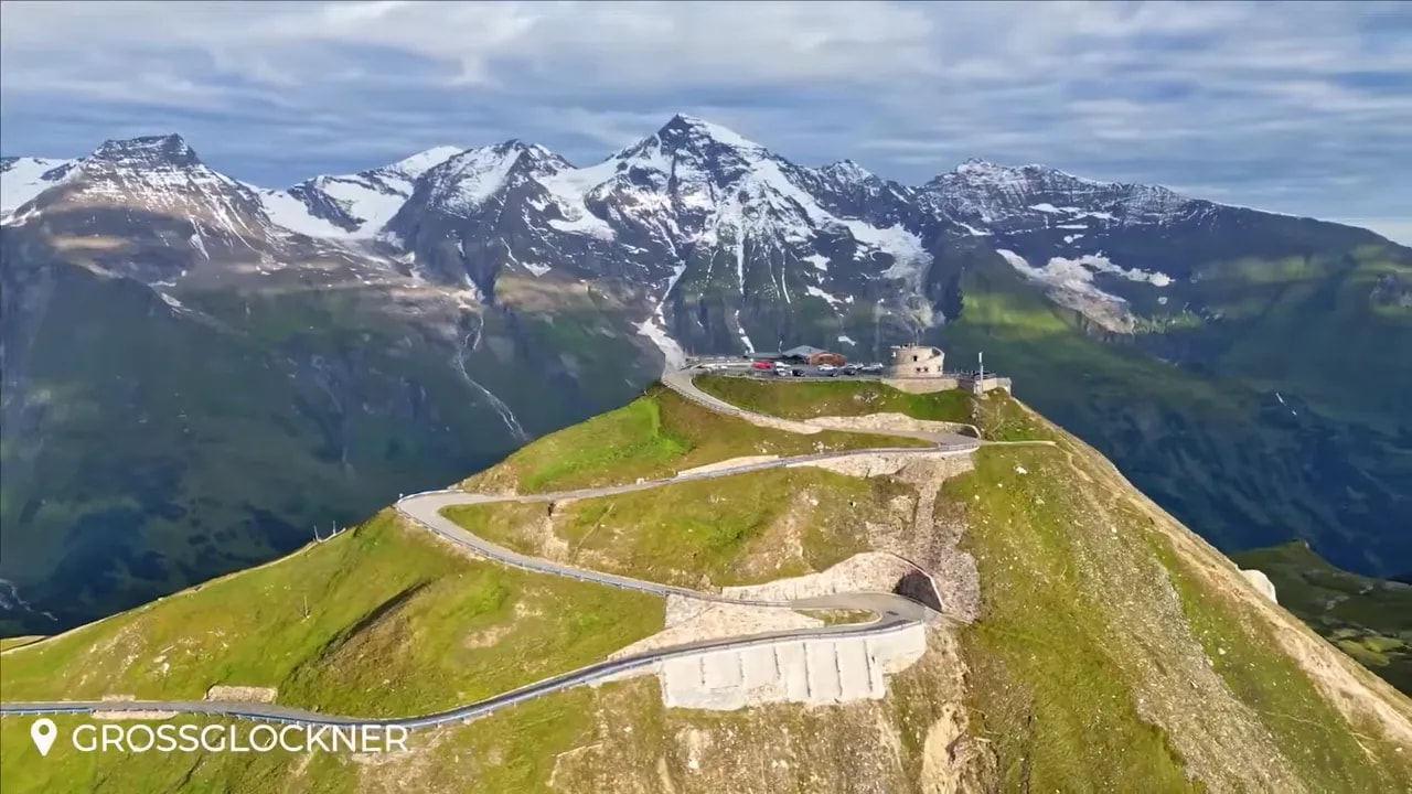 Winding Grossglockner High Alpine Road on a green mountain ridge