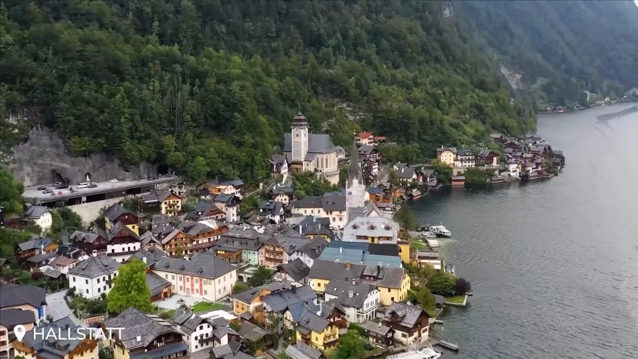 Aerial view of Hallstatt village beside a mountain lake
