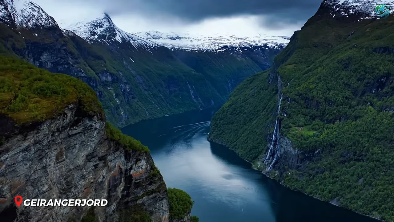 Geirangerfjord winding between steep green mountains